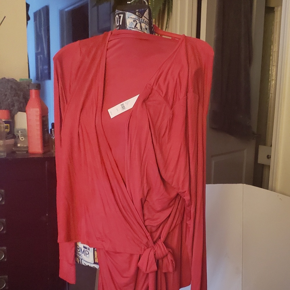 Red knit crossover tie blouse